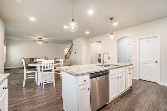 kitchen featuring dark wood-style floors, dishwasher, a ceiling fan, a sink, and open floor plan