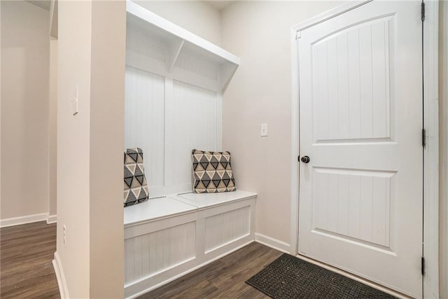 mudroom with baseboards and dark wood-style floors