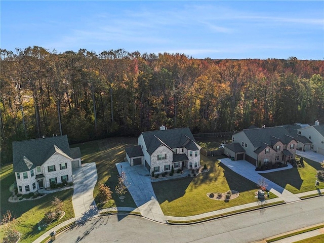 bird's eye view featuring a view of trees