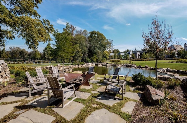 view of patio / terrace with a water view