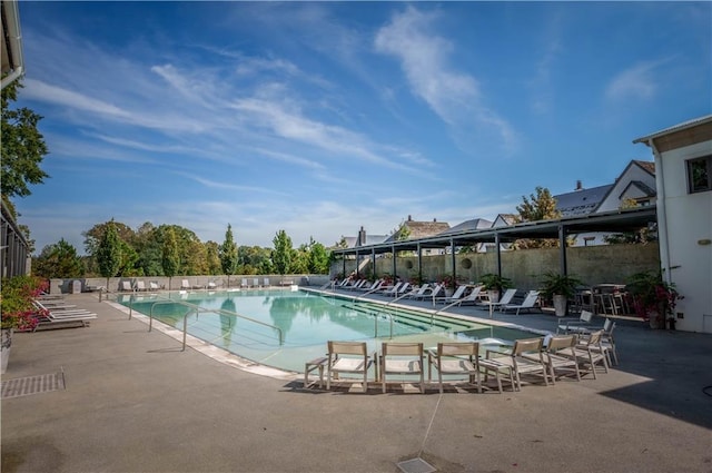 community pool featuring a patio