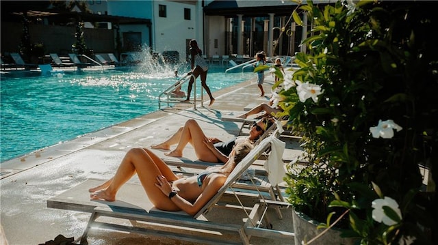 community pool featuring a patio