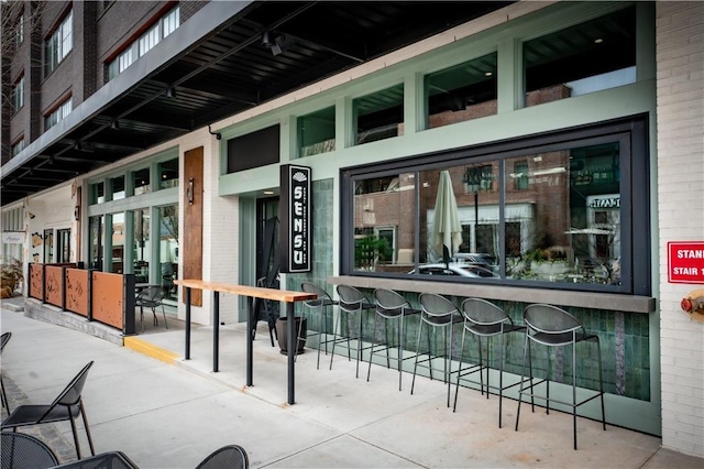 view of patio with outdoor dry bar