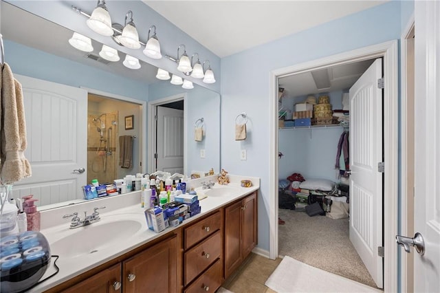 418 Thaxton Ln, Woodstock, GA 30188 - bathroom with double vanity, a tile shower, and tile patterned flooring