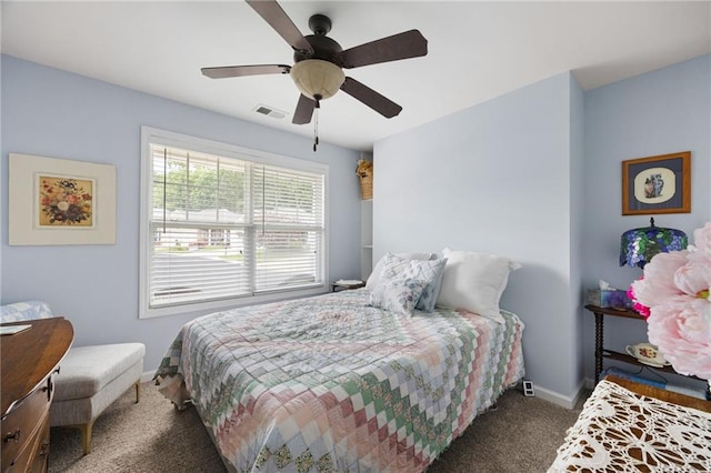418 Thaxton Ln, Woodstock, GA 30188 - carpeted bedroom with baseboards and a ceiling fan