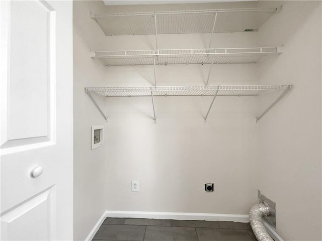 washroom with washer hookup and hookup for an electric dryer