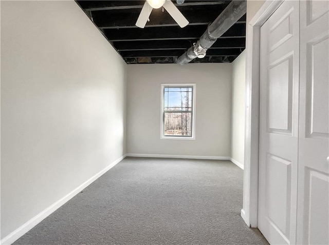 unfurnished room featuring carpet floors and ceiling fan