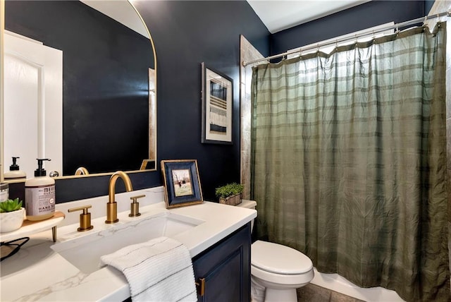 full bathroom featuring vanity, toilet, and shower / tub combo