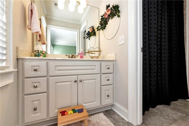 bathroom featuring vanity and ornamental molding