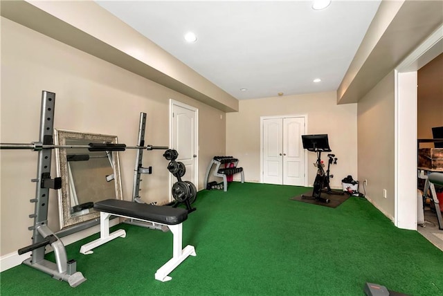 workout area with carpet floors