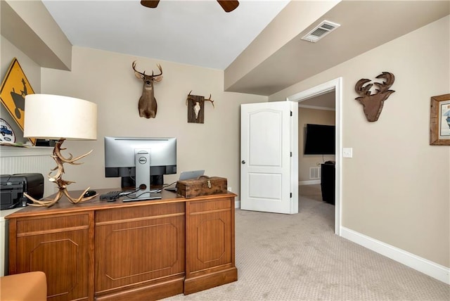 carpeted office with ceiling fan