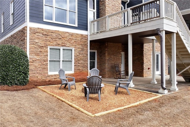 view of patio / terrace featuring a fire pit