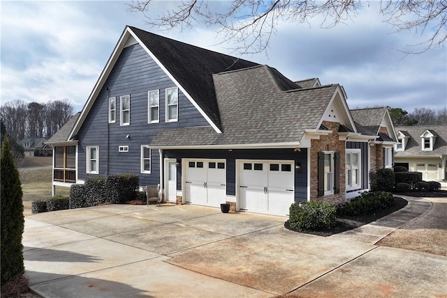 view of side of property with a garage