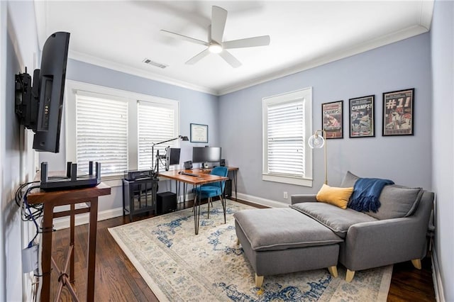 home office featuring ceiling fan, dark wood-style flooring, and crown molding