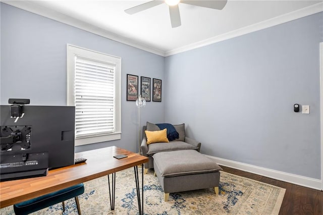 office space with ceiling fan, baseboards, dark wood-style flooring, and ornamental molding