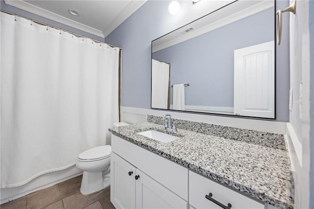 bathroom with visible vents, toilet, tile patterned flooring, crown molding, and vanity