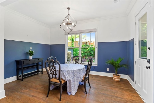 259 Sisson Ave, Atlanta, GA 30317 - dining area featuring wood finished floors and crown molding