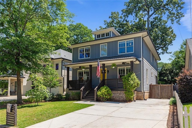 259 Sisson Ave, Atlanta, GA 30317 - american foursquare style home with board and batten siding, covered porch, and driveway