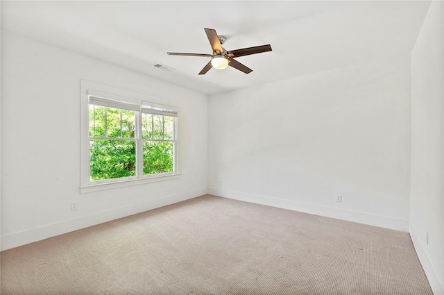 259 Sisson Ave, Atlanta, GA 30317 - empty room with a ceiling fan and light colored carpet