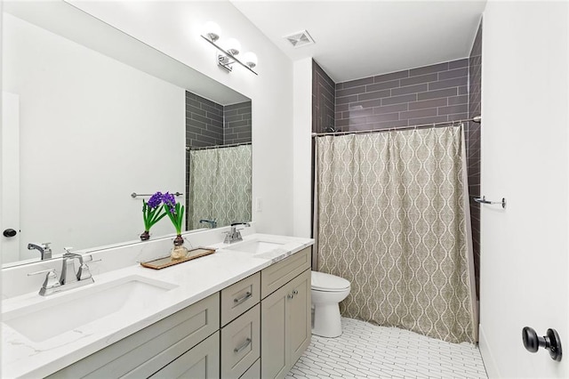 259 Sisson Ave, Atlanta, GA 30317 - bathroom featuring double vanity, tile patterned floors, and a shower with curtain