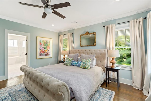 259 Sisson Ave, Atlanta, GA 30317 - bedroom featuring multiple windows, wood finished floors, recessed lighting, ensuite bathroom, and ornamental molding