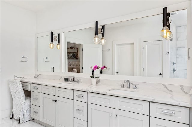 259 Sisson Ave, Atlanta, GA 30317 - bathroom with double vanity, marble finish flooring, and a shower