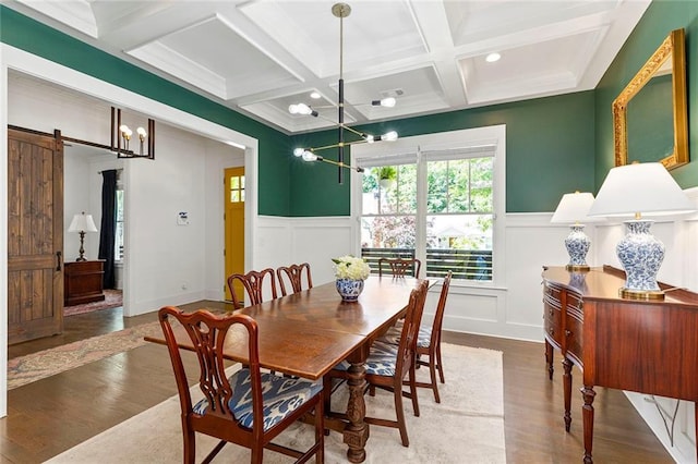 259 Sisson Ave, Atlanta, GA 30317 - dining area with a chandelier, coffered ceiling, wood finished floors, beamed ceiling, and a barn door