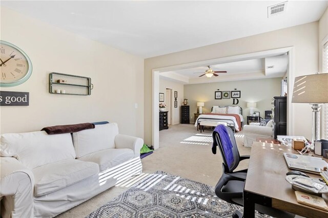 laundry area with washer and dryer and light tile patterned floors