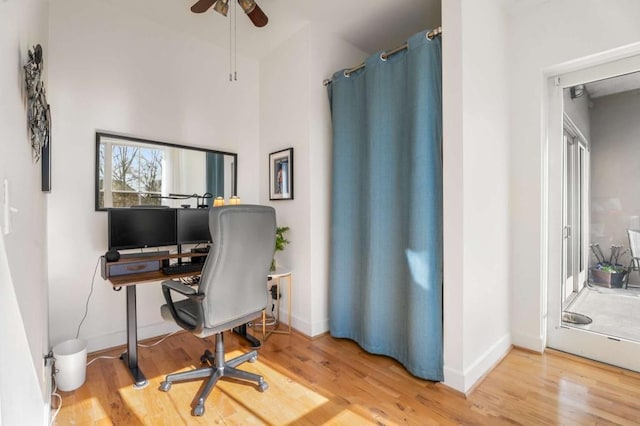 office area featuring hardwood / wood-style floors and ceiling fan