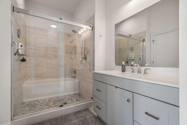 bathroom with vanity and an enclosed shower