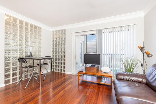 living room featuring hardwood / wood-style flooring and ornamental molding