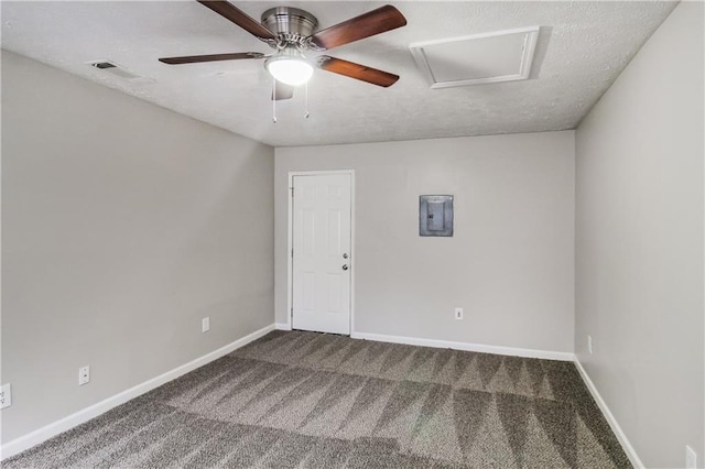 unfurnished room with carpet and electric panel