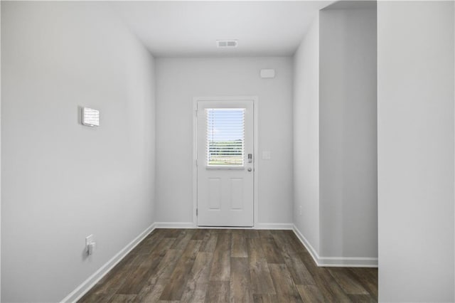 doorway to outside with dark hardwood / wood-style flooring