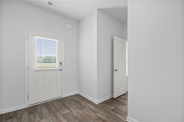 doorway to outside featuring dark hardwood / wood-style flooring