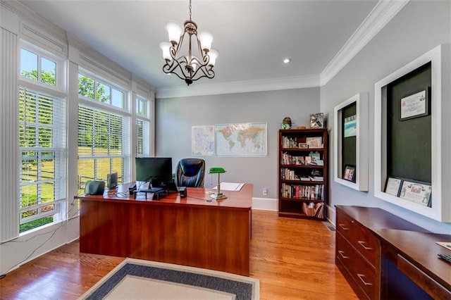 office with ornamental molding, a chandelier, and light hardwood / wood-style flooring