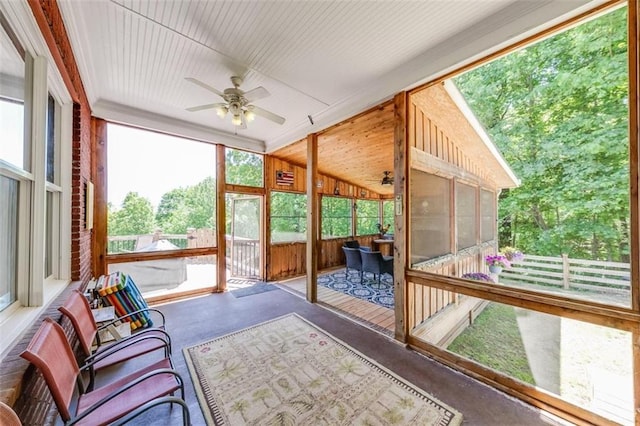 sunroom / solarium with ceiling fan