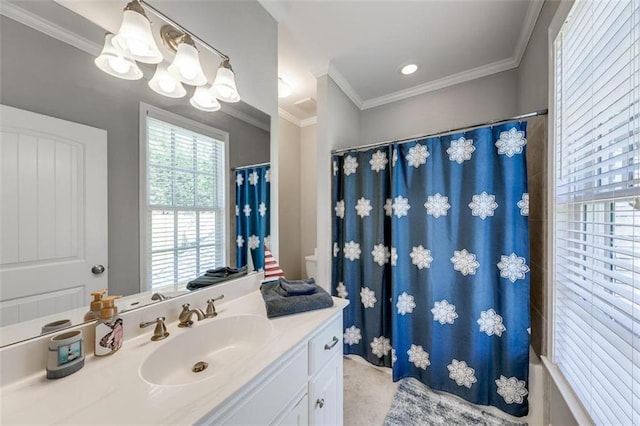 bathroom with shower / bath combo with shower curtain, a chandelier, vanity, and ornamental molding