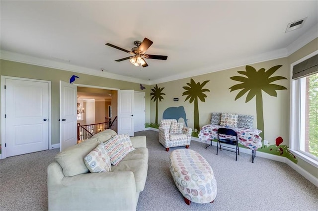 carpeted living room featuring ornamental molding and plenty of natural light