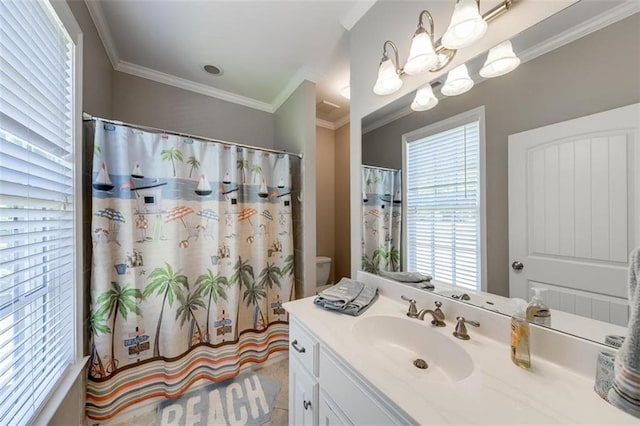 bathroom with toilet, vanity, ornamental molding, and a chandelier