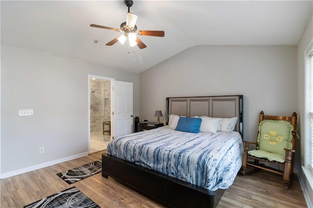 113 Regent Pl, Woodstock, GA 30188 - bedroom featuring light wood-type flooring, vaulted ceiling, baseboards, ceiling fan, and ensuite bath