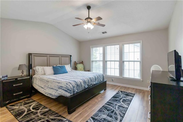 113 Regent Pl, Woodstock, GA 30188 - bedroom with vaulted ceiling, light wood-style flooring, ceiling fan, and baseboards