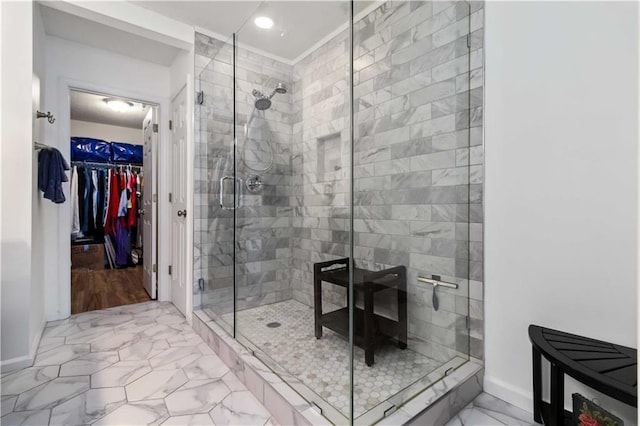 113 Regent Pl, Woodstock, GA 30188 - full bath with a stall shower, marble look tiles, a walk in closet, baseboards, and recessed lighting