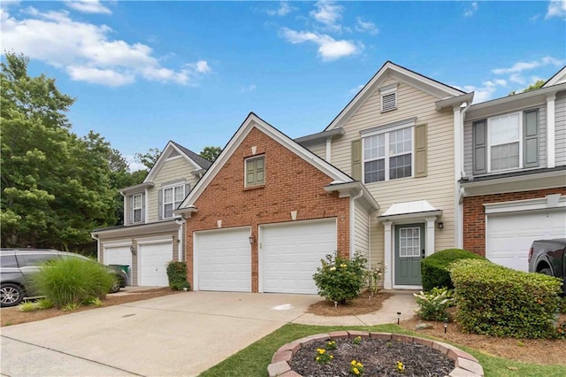 113 Regent Pl, Woodstock, GA 30188 - view of front of house featuring an attached garage, driveway, and brick siding