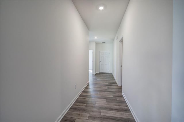 hallway featuring dark hardwood / wood-style floors