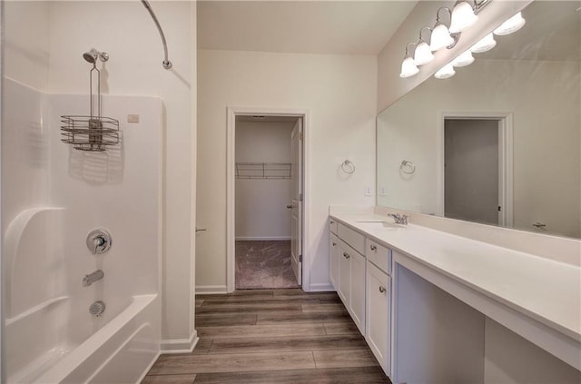 bathroom with vanity and tub / shower combination