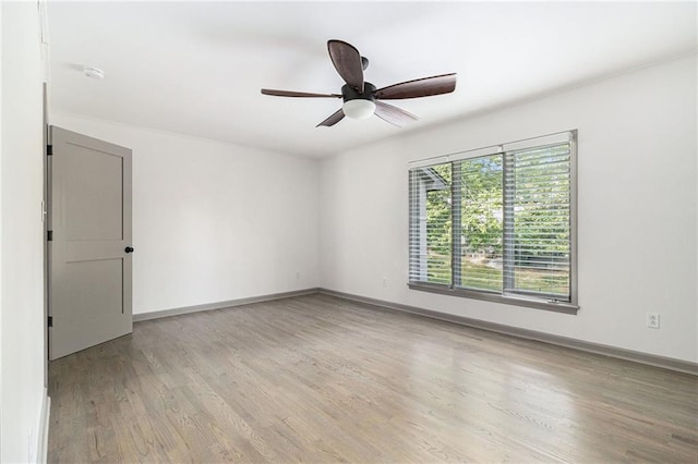26 Ivy Pkwy NE, Atlanta, GA 30342 - unfurnished room with wood finished floors, ceiling fan, and baseboards