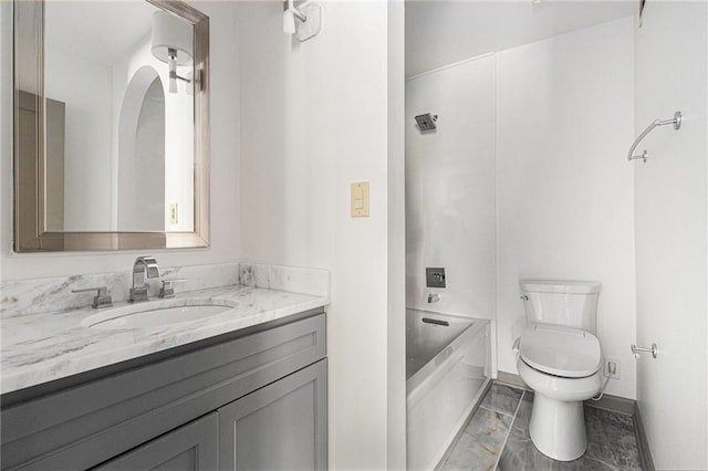 26 Ivy Pkwy NE, Atlanta, GA 30342 - bathroom with vanity, toilet, marble finish flooring, baseboards, and shower / bath combination