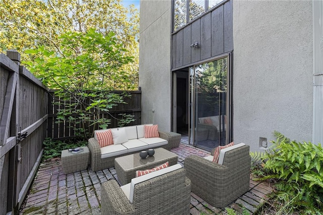 26 Ivy Pkwy NE, Atlanta, GA 30342 - fenced backyard with outdoor lounge area and a patio area