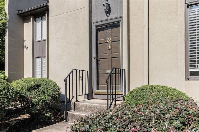 26 Ivy Pkwy NE, Atlanta, GA 30342 - doorway to property with stucco siding