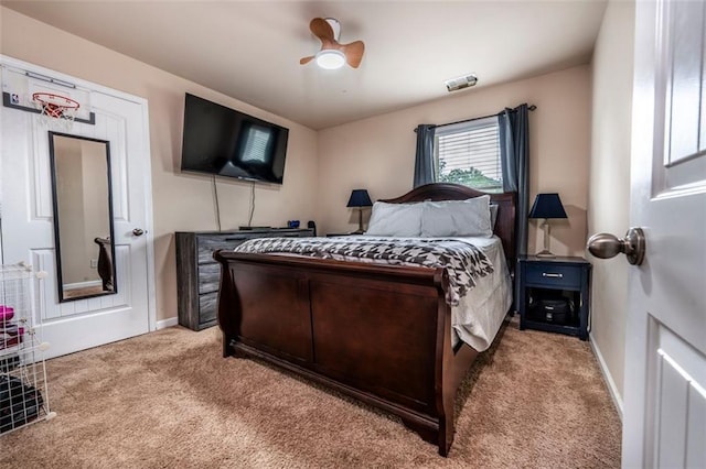 8553 Braylen Manor Dr, Douglasville, GA 30134 - bedroom with carpet, baseboards, and a ceiling fan